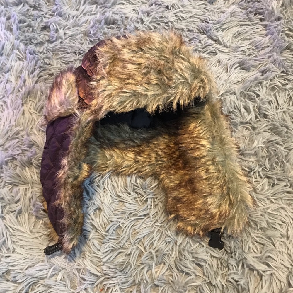 Brown Paris fur ushanka styled hat.